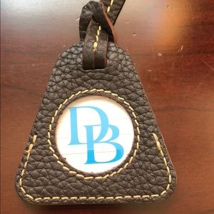 Dooney & Bourke luggage tag
